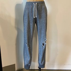 Fleece jogger sweatpants with holes